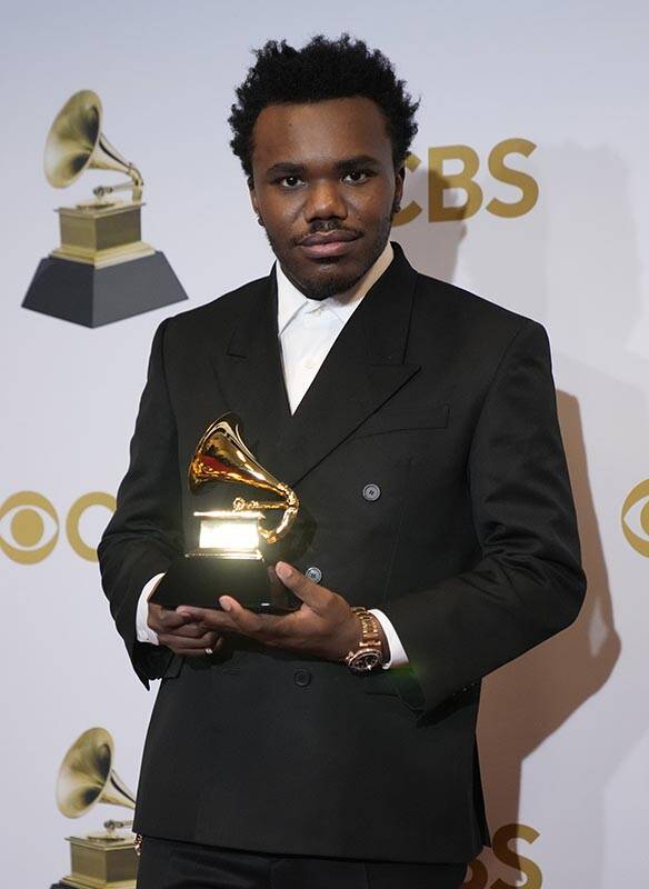 Baby Keem, winner of the award for best rap performance for "Family Ties," poses in t ...