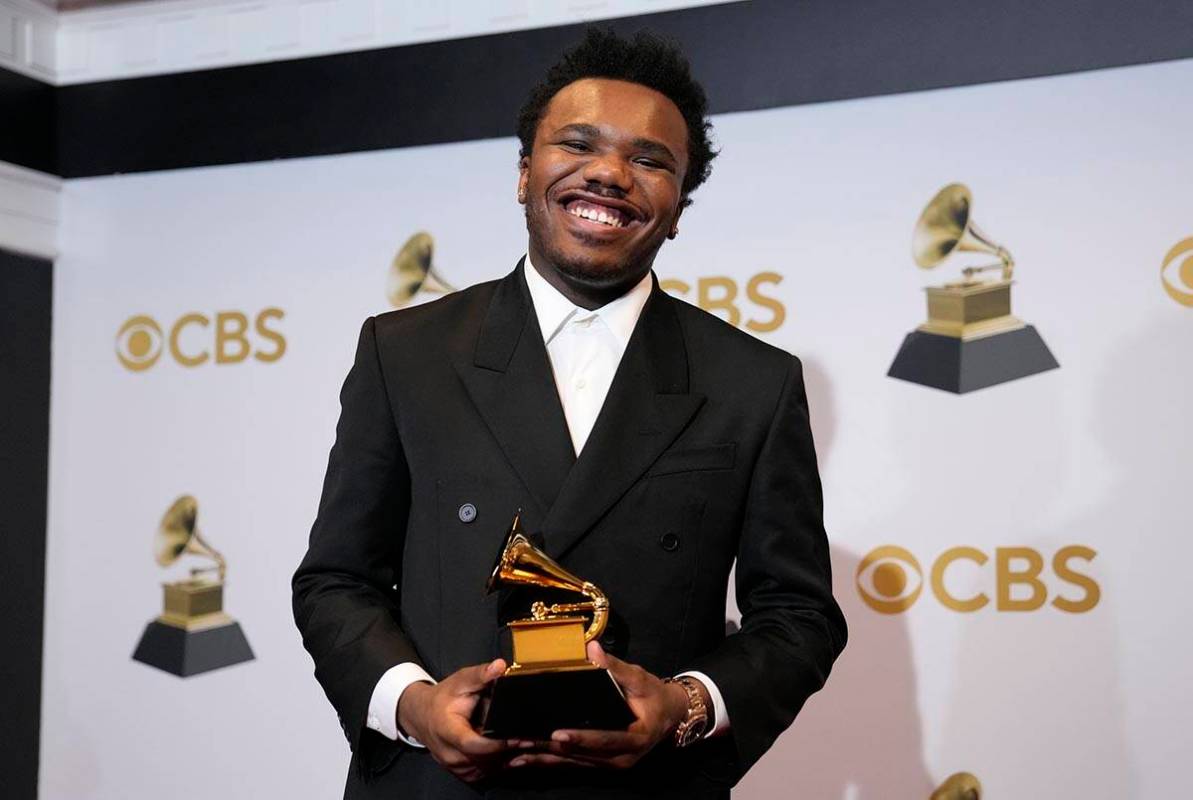 Baby Keem, winner of the award for best rap performance for "Family Ties," poses in t ...
