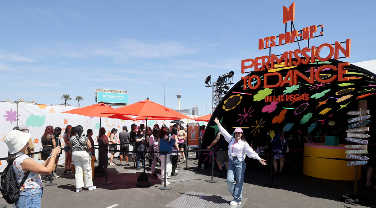 Zoraya Gonzalez, 56, takes a photo of her daughter Carolina Alvarado, 29, both of Mexico, at a ...