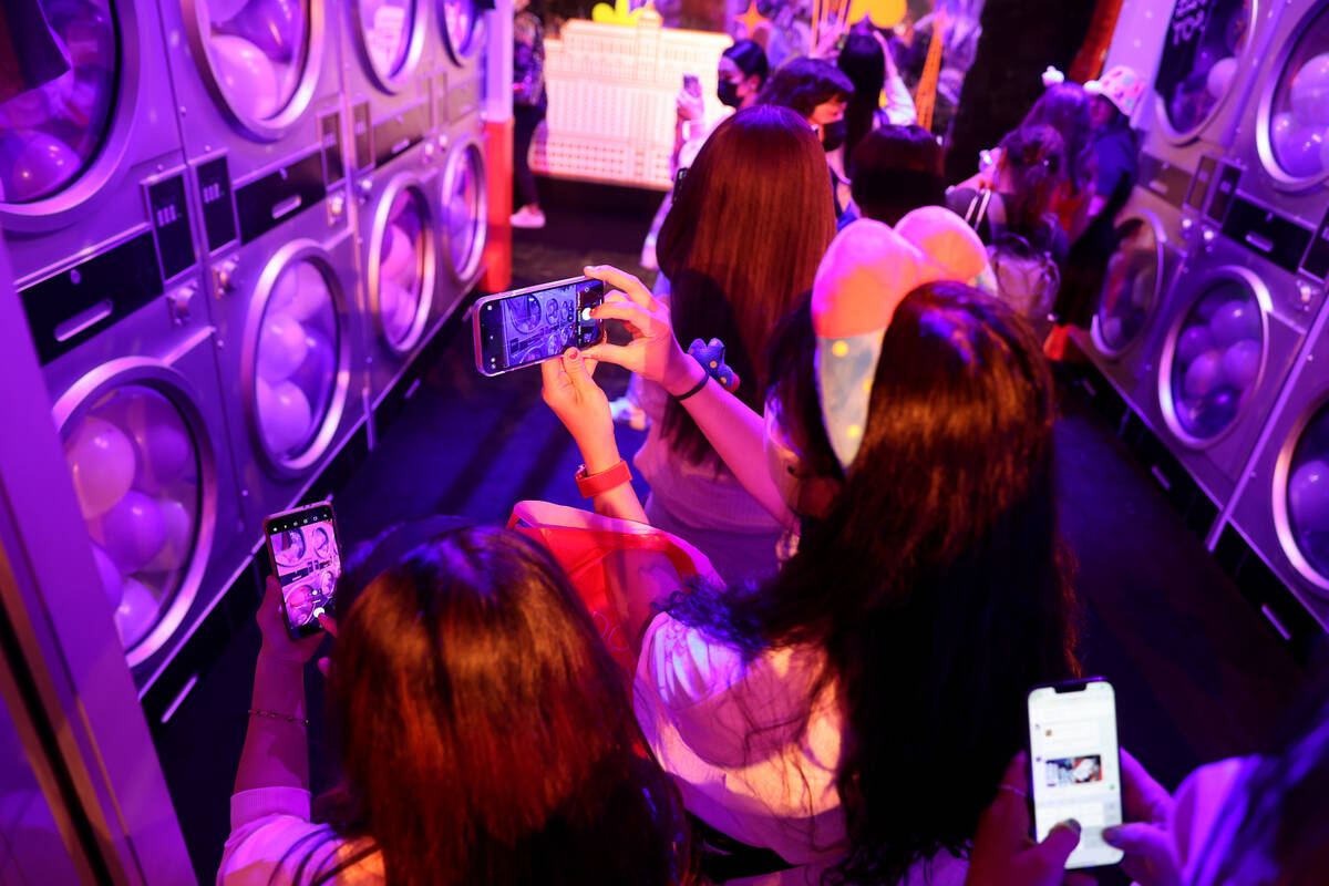 BTS fans take in a free BTS Pop-up at Area15 in Las Vegas Friday, April 8, 2022, ahead of the f ...