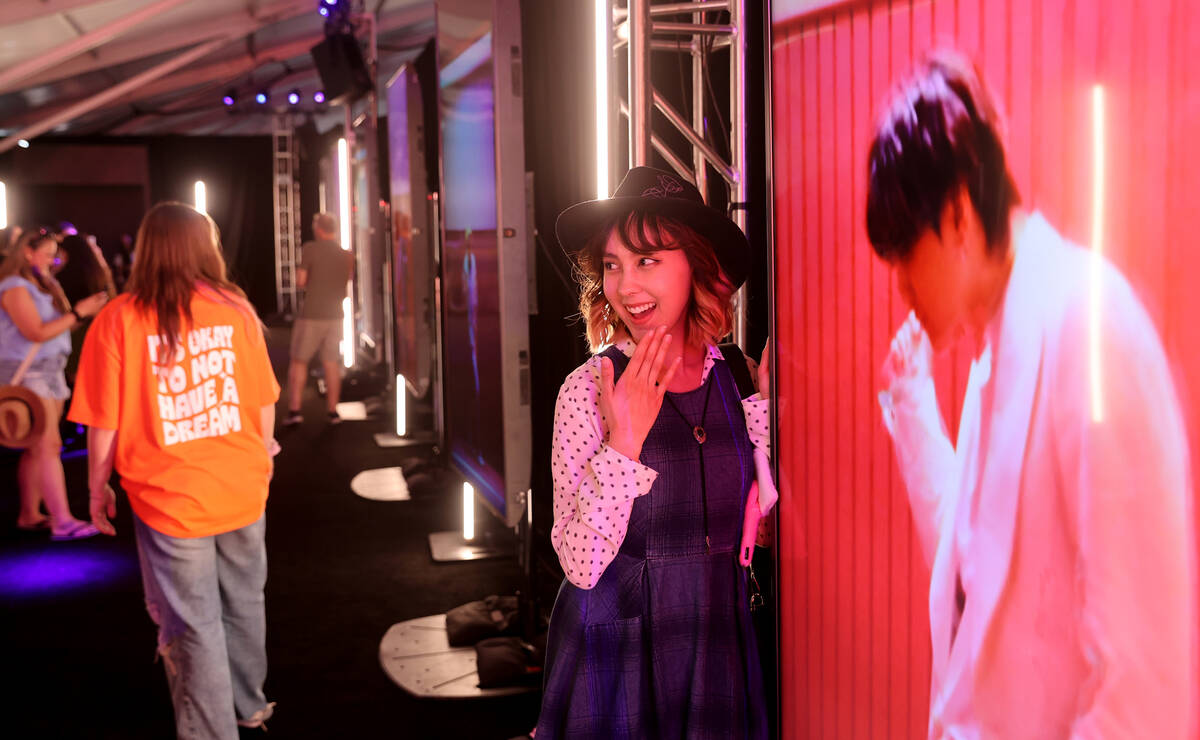 BTS fans, including Angelica Skalski, 24, of Victorville, Calif., takes in a free BTS Pop-up at ...