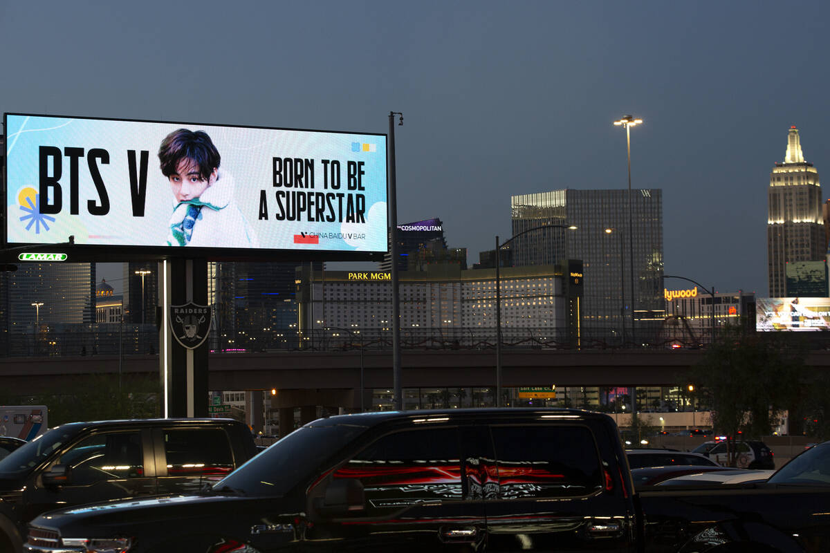 A billboard features a BTS message as Allegiant Stadium holds the Korean boy band’s sold ...