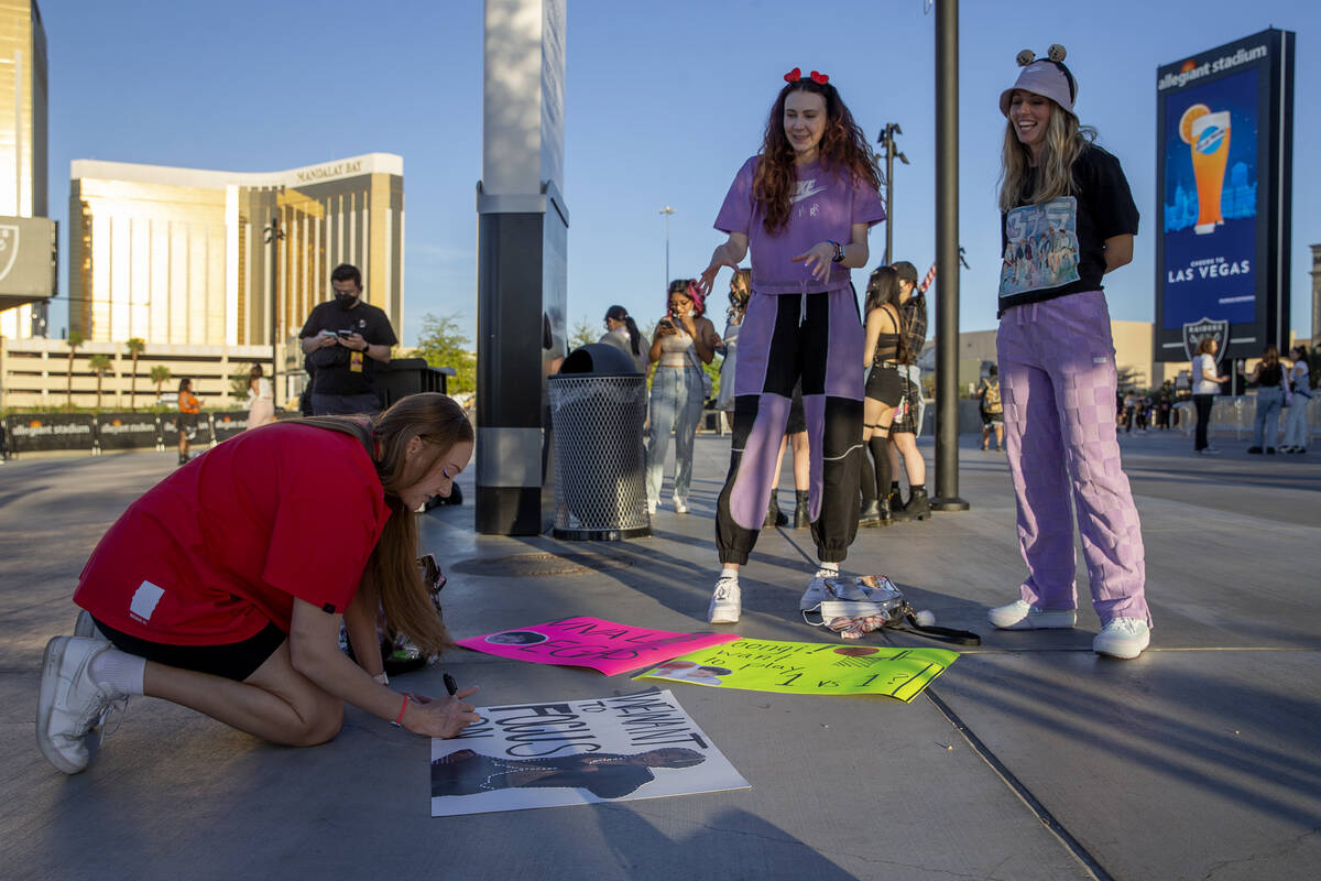 Ann Tait, of Henderson, left, her sister Hillary Tait, center, and Laura Bradley, of Washington ...