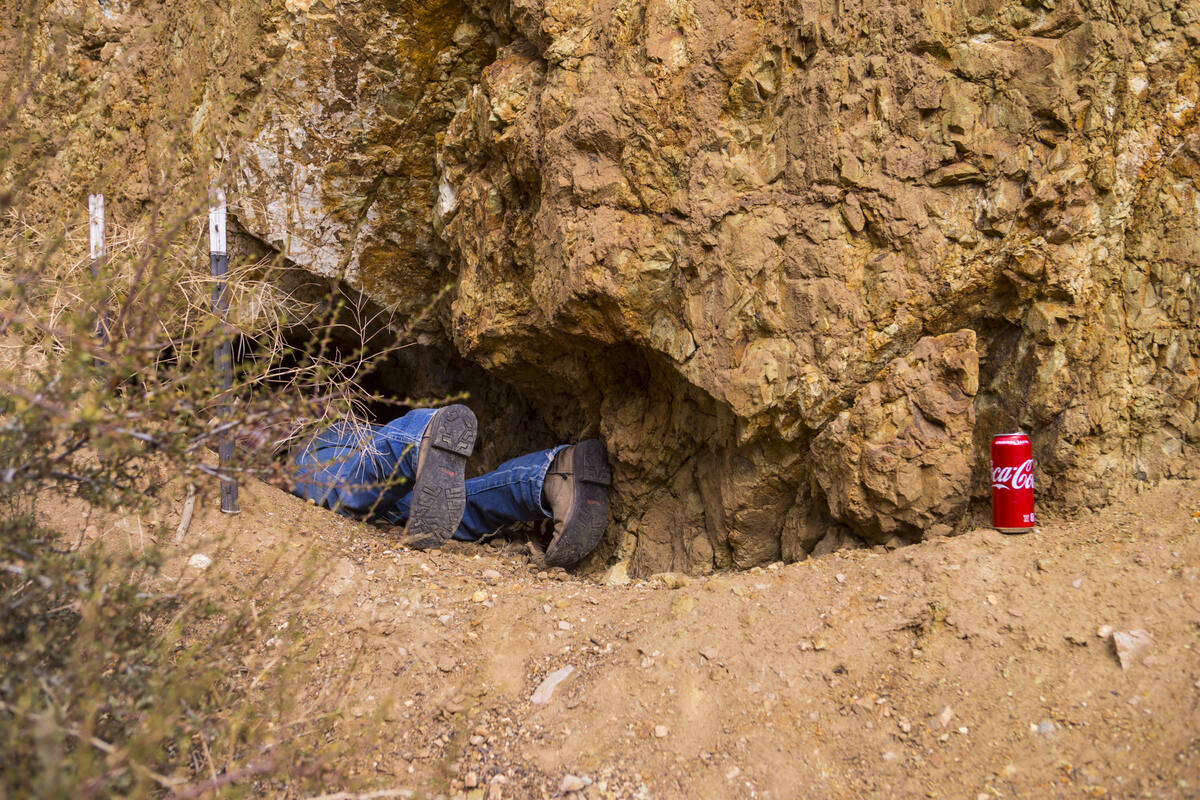 Caden Gould of Genoa enters a mine in search of old denim and other antiquities in south Dougla ...