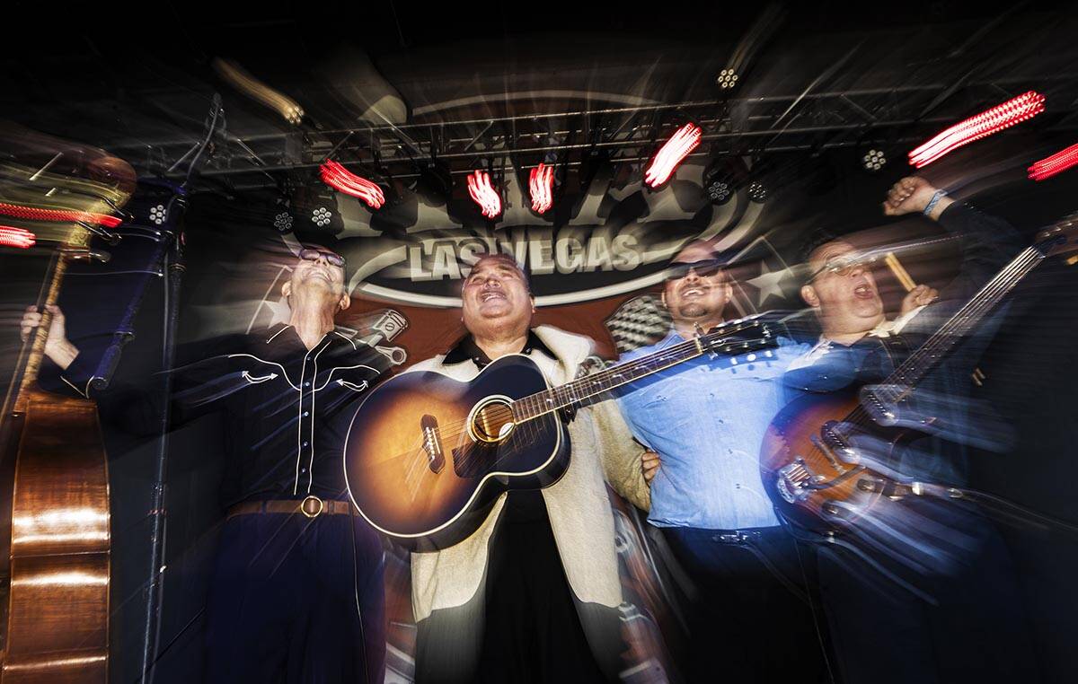 Big Sandy & His Fly-Rite Boys perform during the Rockabilly Car Show at Viva Las Vegas Rock ...