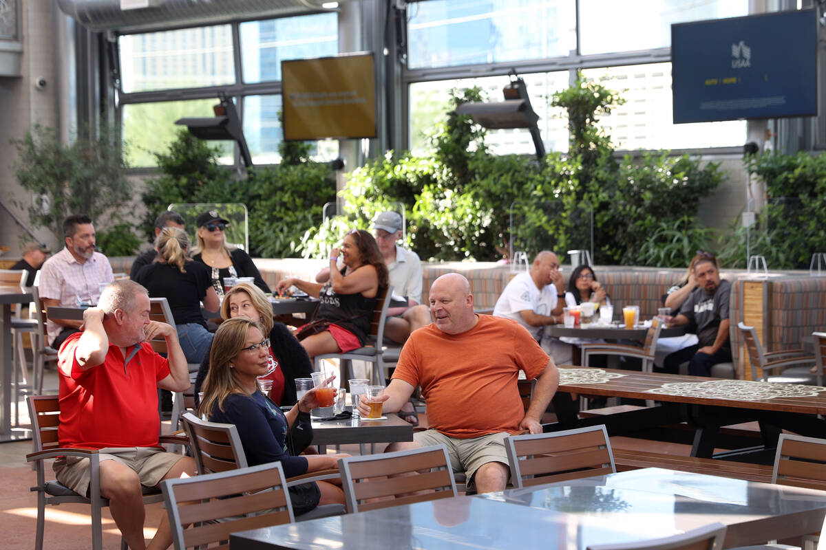 Customers watch a Raiders game at The Front Yard inside of the Ellis Island hotel-casino in Las ...