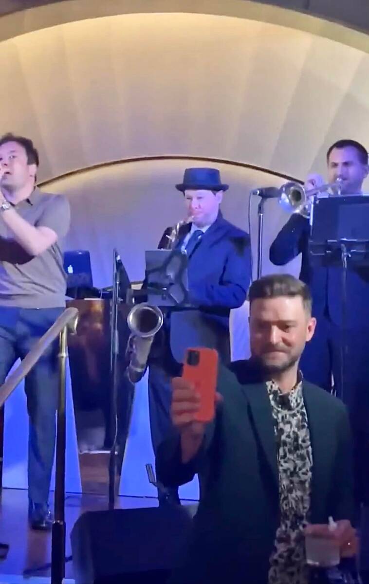 Justin Timerlake shoots a selfie as Jimmy Fallon, Rob Stone and Jason Levi perform at Delilah a ...