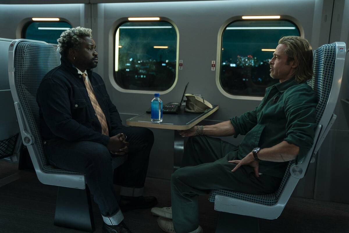 Bryan Tyree Henry, left, and Brad Pitt star in "Bullet Train." (Scott Garfield)
