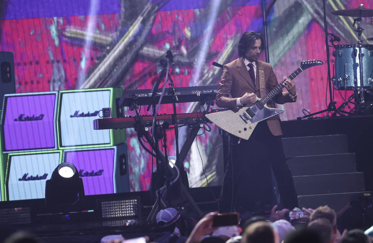 Brian Bell of Weezer performs following the first round of the NFL draft on Thursday, April 28, ...