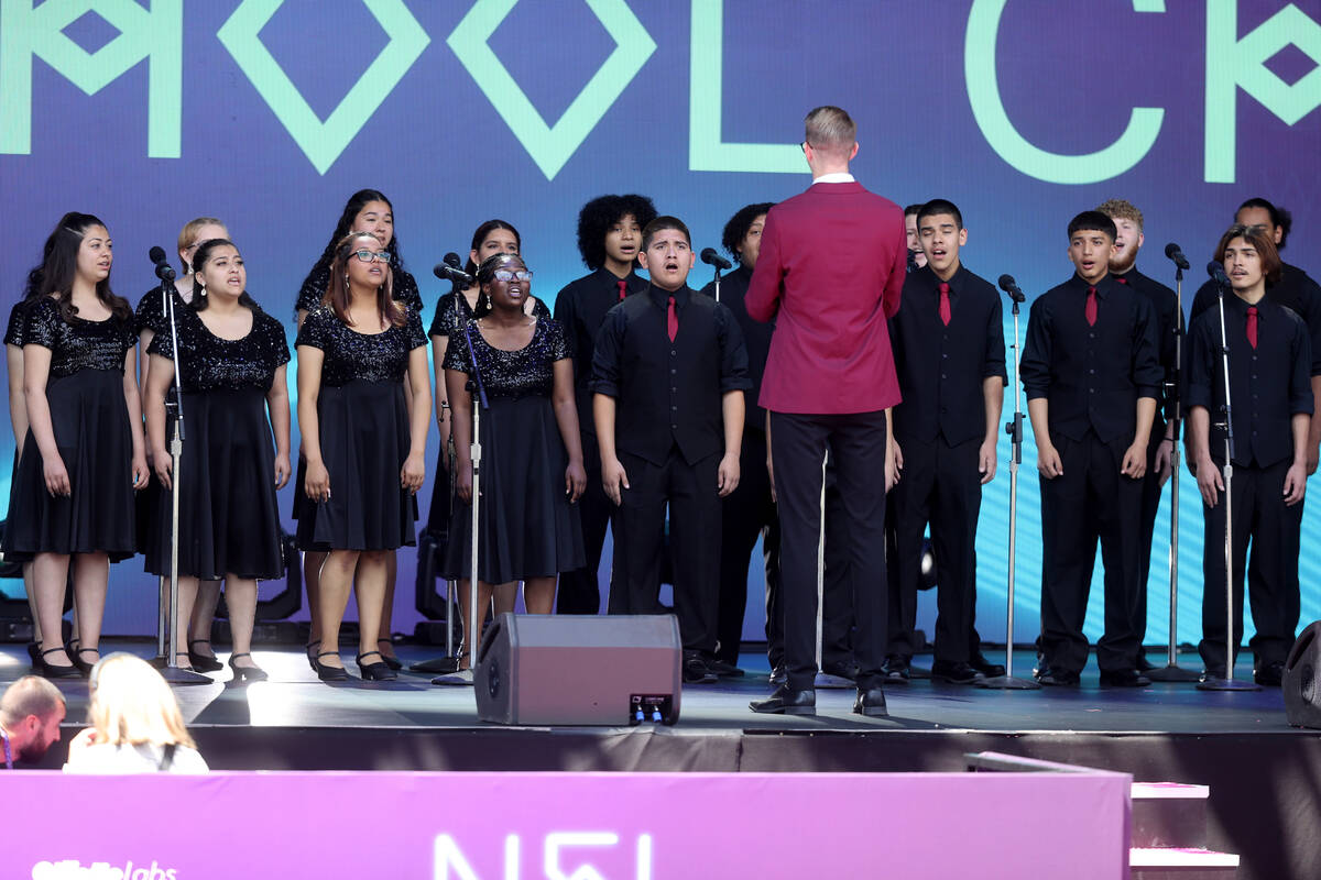 Eldorado High School Madrigal Singers perform on the Bellagio fountains during the final day of ...