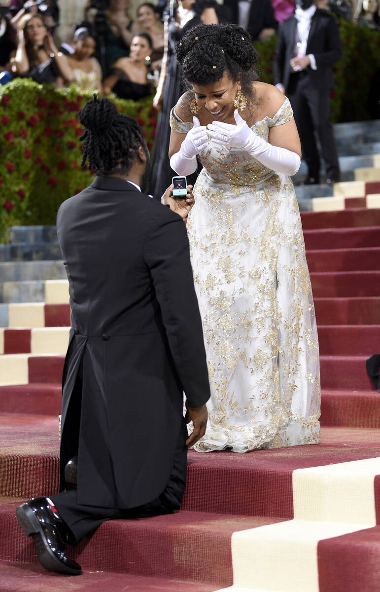 Former New York State Assembly candidate Bobby Digi Olisa, left, proposes to Laurie Cumbo, Comm ...