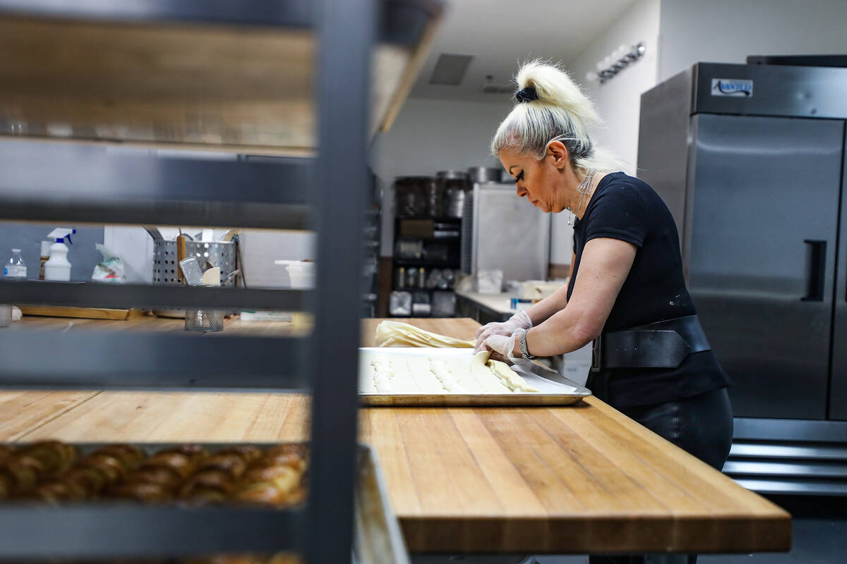 Owner Asmik Yetaryan makes cheese puffs at Van Bakery in Las Vegas, in Las Vegas, Thursday, Apr ...