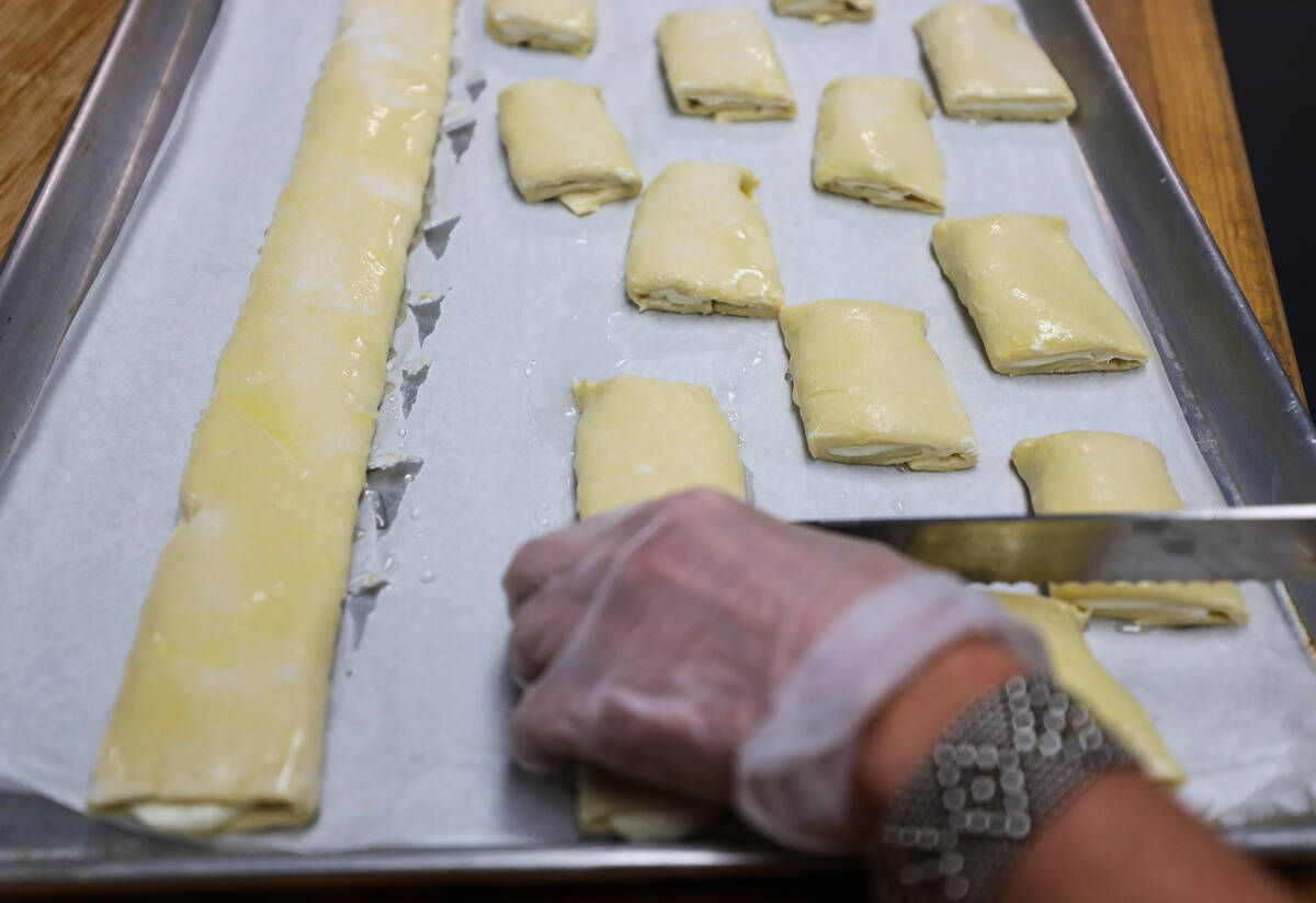 Owner Asmik Yetaryan makes cheese puffs at Van Bakery in Las Vegas, in Las Vegas, Thursday, Apr ...