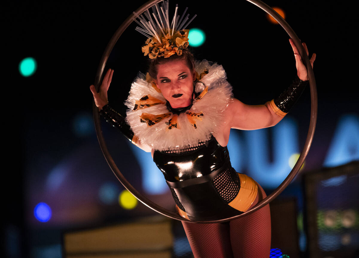 An aerialist performs during the second day of the Electric Daisy Carnival at the Las Vegas Mot ...