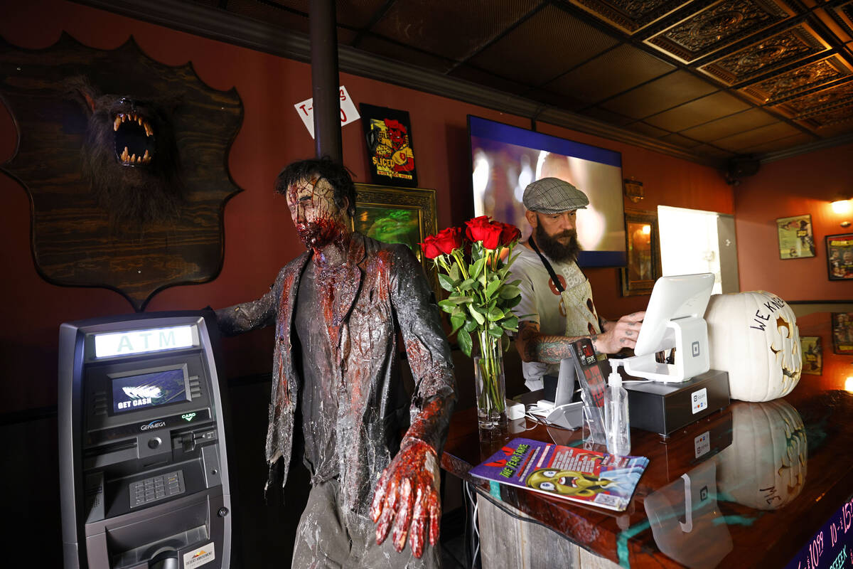 Sliced Pizza co-owner Cash Sakoulas works at his shop, Sunday, May 8, 2022, in Las Vegas. (Chit ...