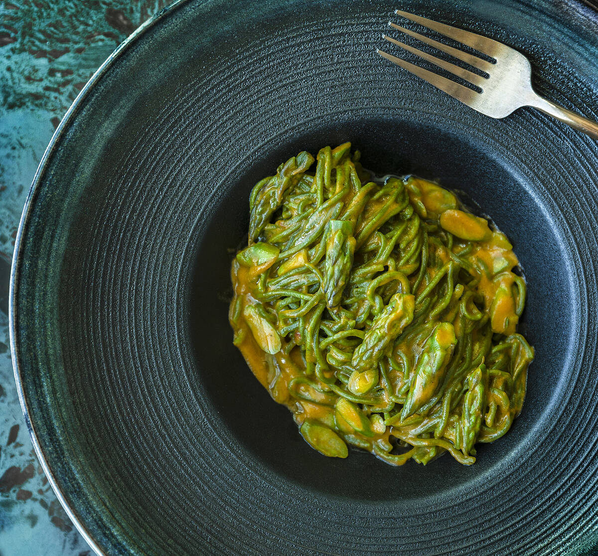 Spinach tagliarini tossed with Calabrian-style pesto sauce at Anima by Edo on Tuesday, May 3, 2 ...