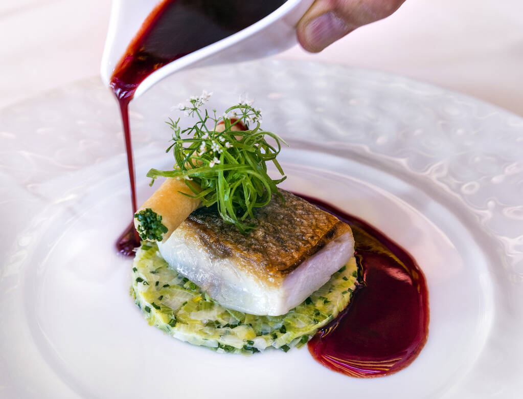 Brittany sea bass with leek fondue at Le Cirque restaurant within the Bellagio on Wednesday, Ma ...