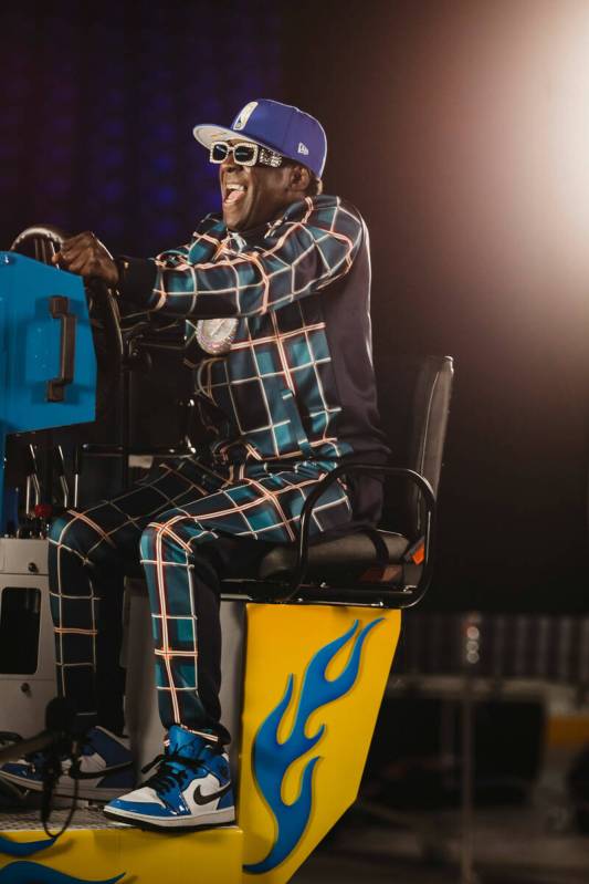 Flavor Flavor is shown driving the Zamboni during The Dollar Loan Center's new ad campaign on T ...