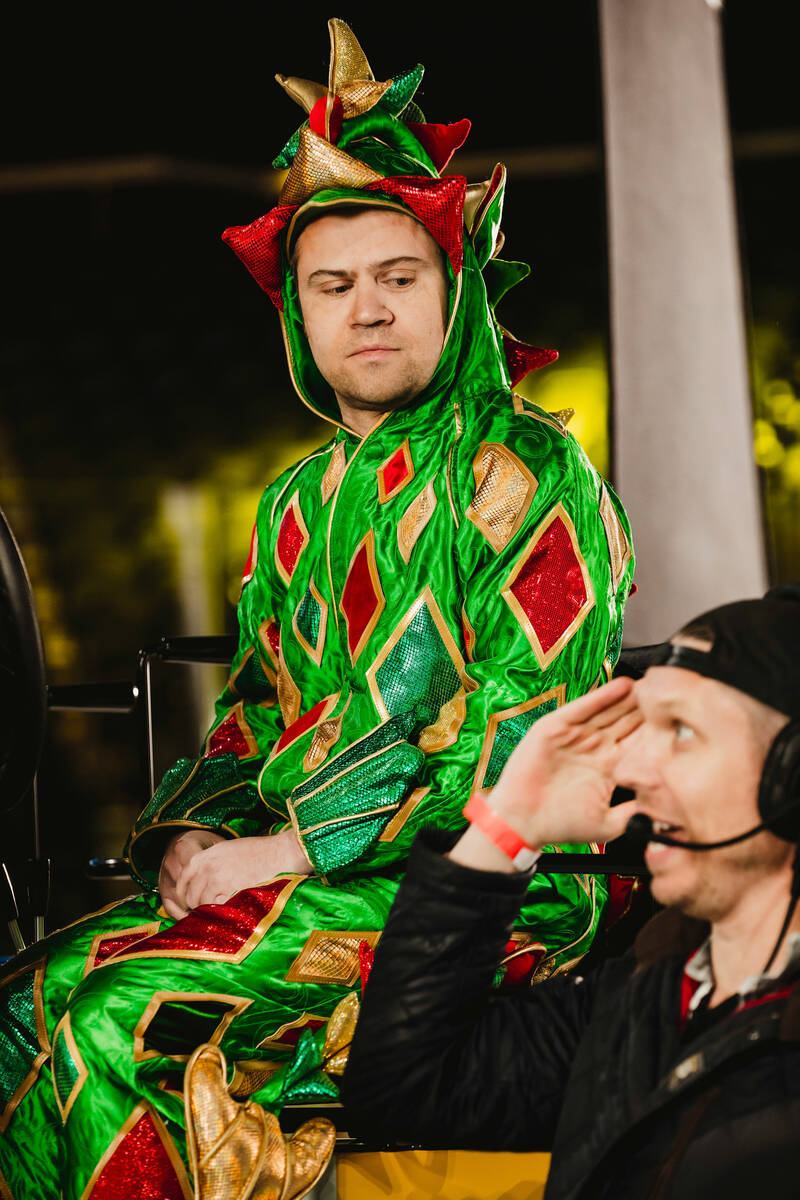 Piff the Magic Dragon listens to direction as he records a video for The Dollar Loan Center on ...