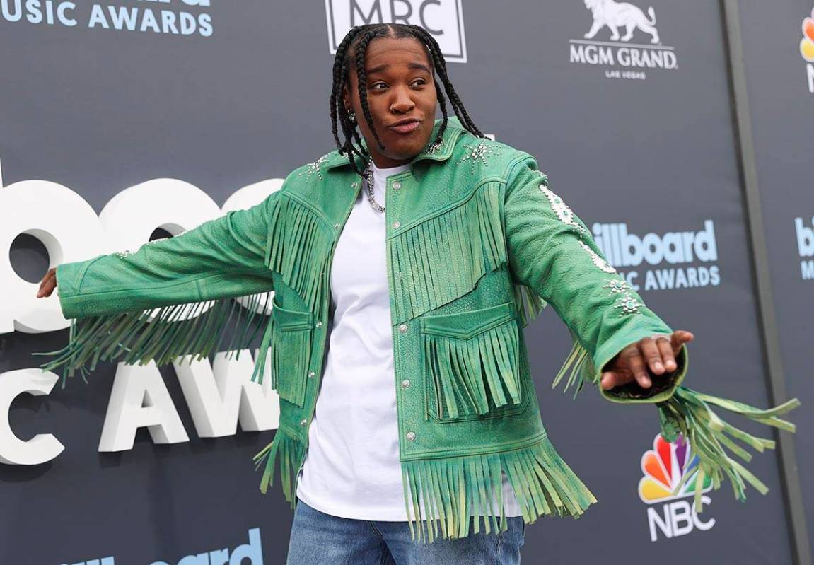 Jozzy poses on the red carpet for the Billboard Music Awards at the MGM Grand Garden on Sunday, ...