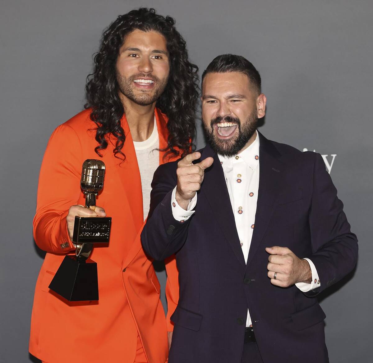 Dan Smyers, left, and Shay Mooney, of duo Dan + Shay, pose with the award for “Top Country Du ...