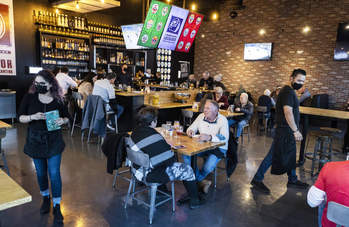 Guests enjoy dinner at El Luchador Mexcian Kitchen + Cantina on Friday, March 12, 2021, in Las ...