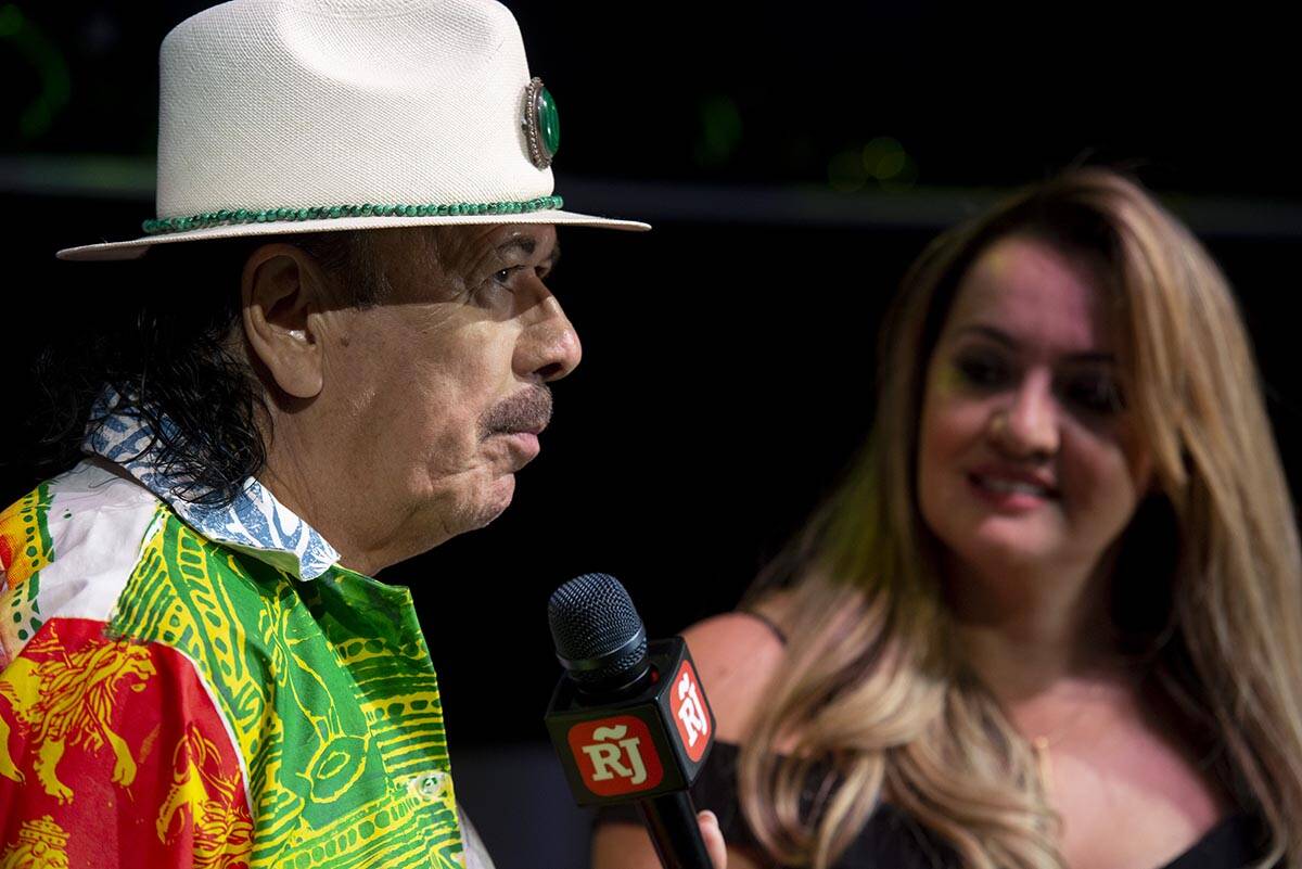 Carlos Santana talks to the Review-Journal's Rosana Romero during a press conference to announc ...
