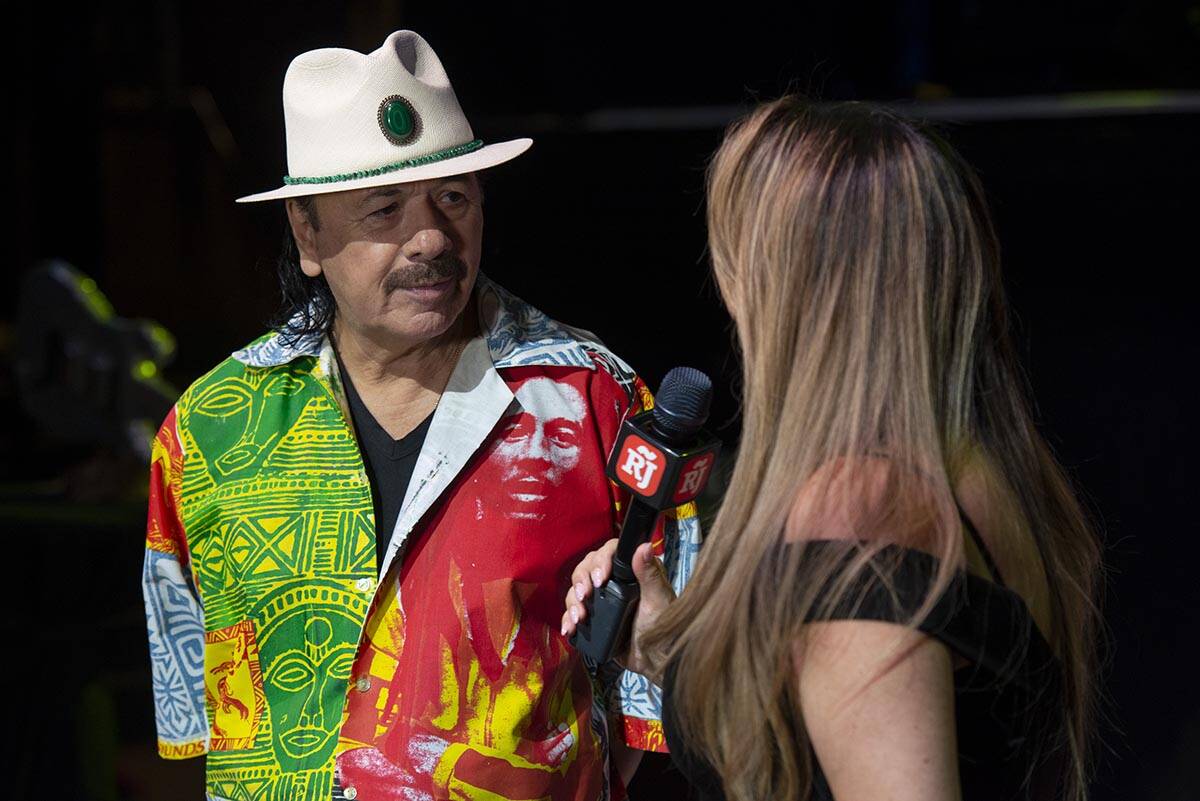 Carlos Santana talks to the Review-Journal's Rosana Romero during a press conference to announc ...