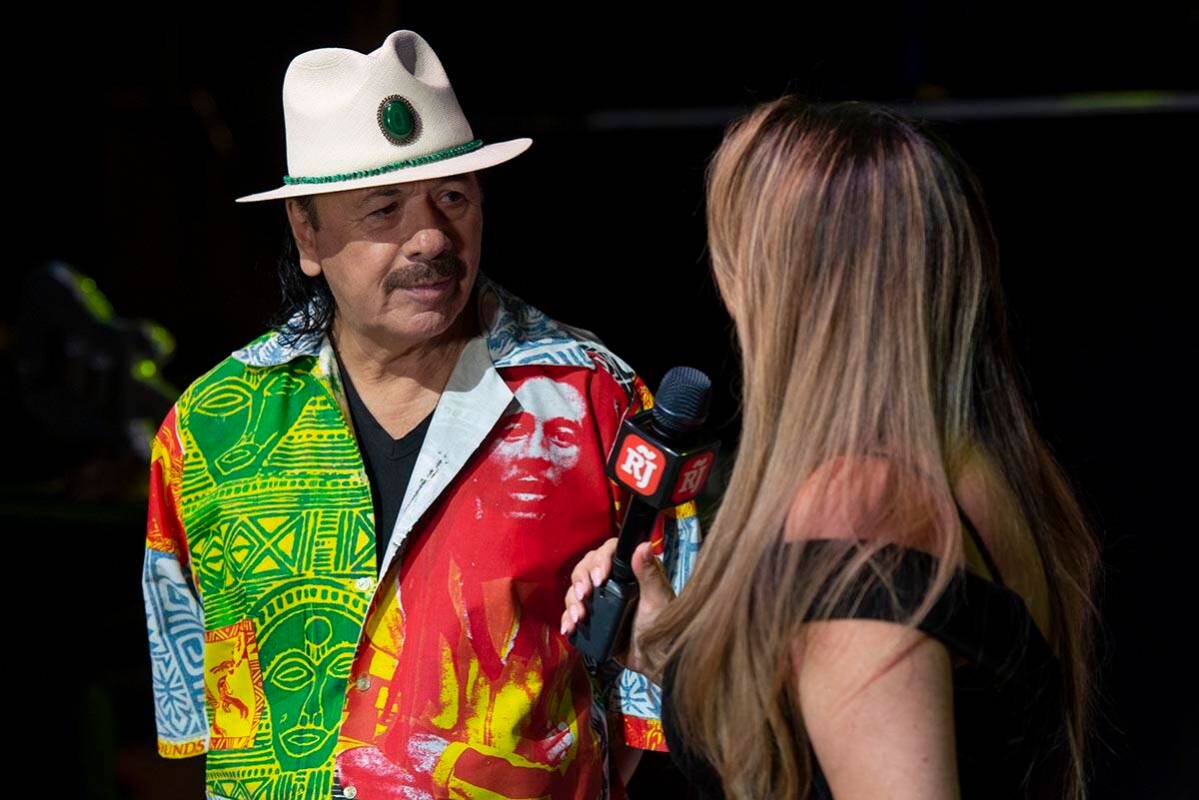 Carlos Santana talks to the Review-Journal's Rosana Romero during a press conference to announc ...
