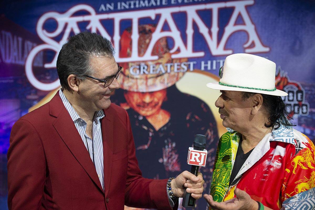 Carlos Santana talks to the Review-Journal's John Katsilometes during a press conference to ann ...