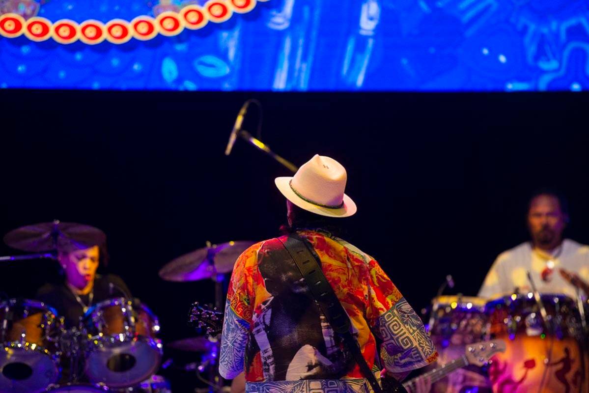 Carlos Santana performs a sound check after a press conference to announce an extension of Sant ...