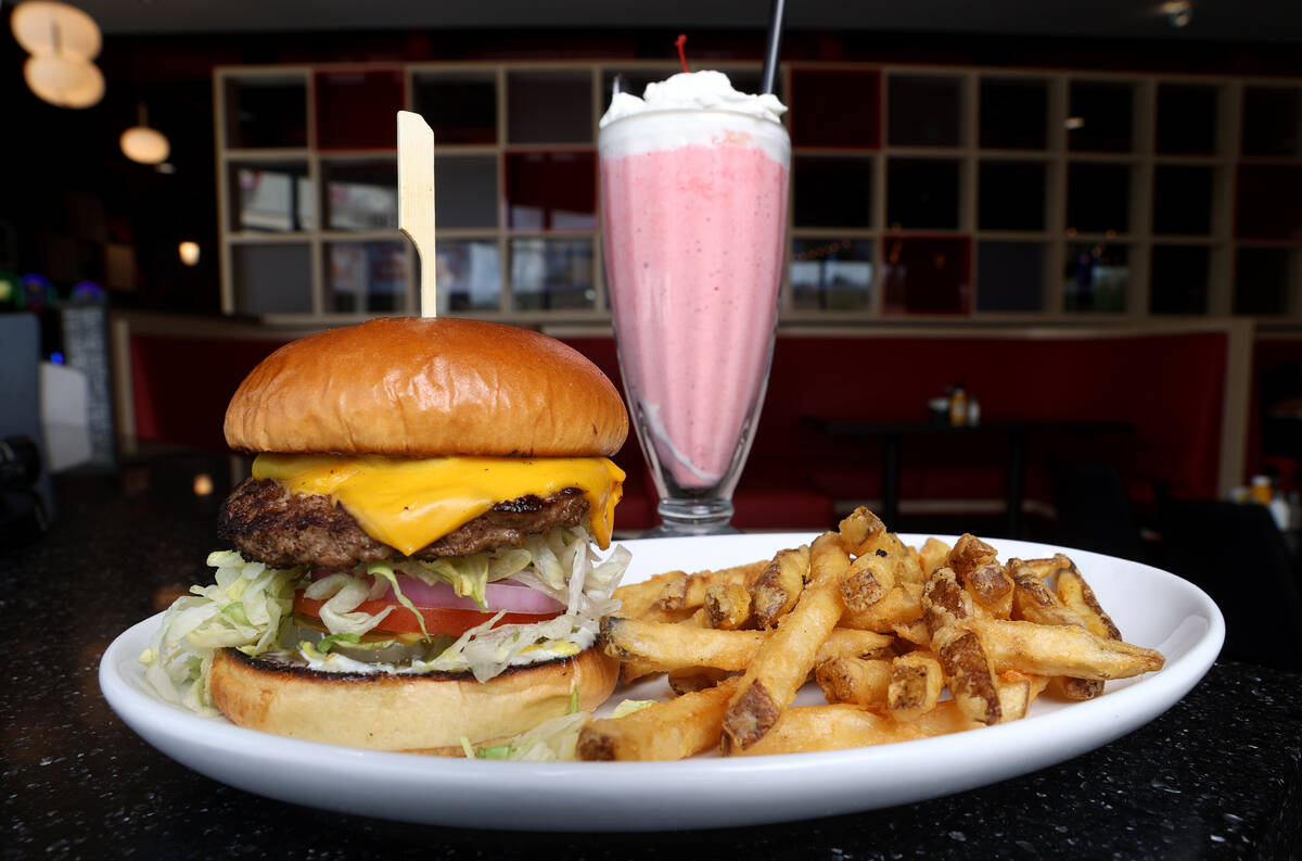 Best Cheeseburger on the Planet with French fries and hand-dipped strawberry shake at Big Boy T ...