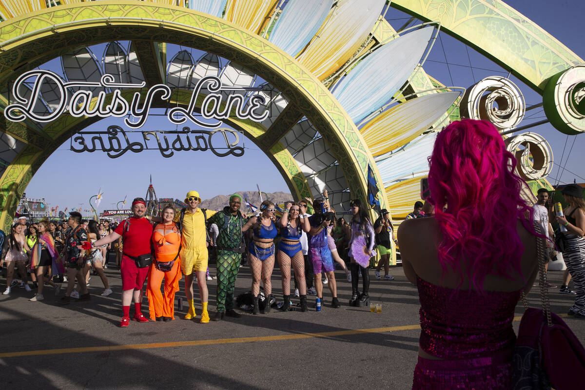 A group from Arizona that nicknamed themselves “ROYGBIV” poses for a photo during ...
