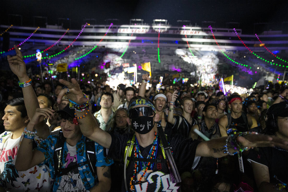 Kyle Gerberding, of California, center, dances while K?D performs during the first day of the E ...
