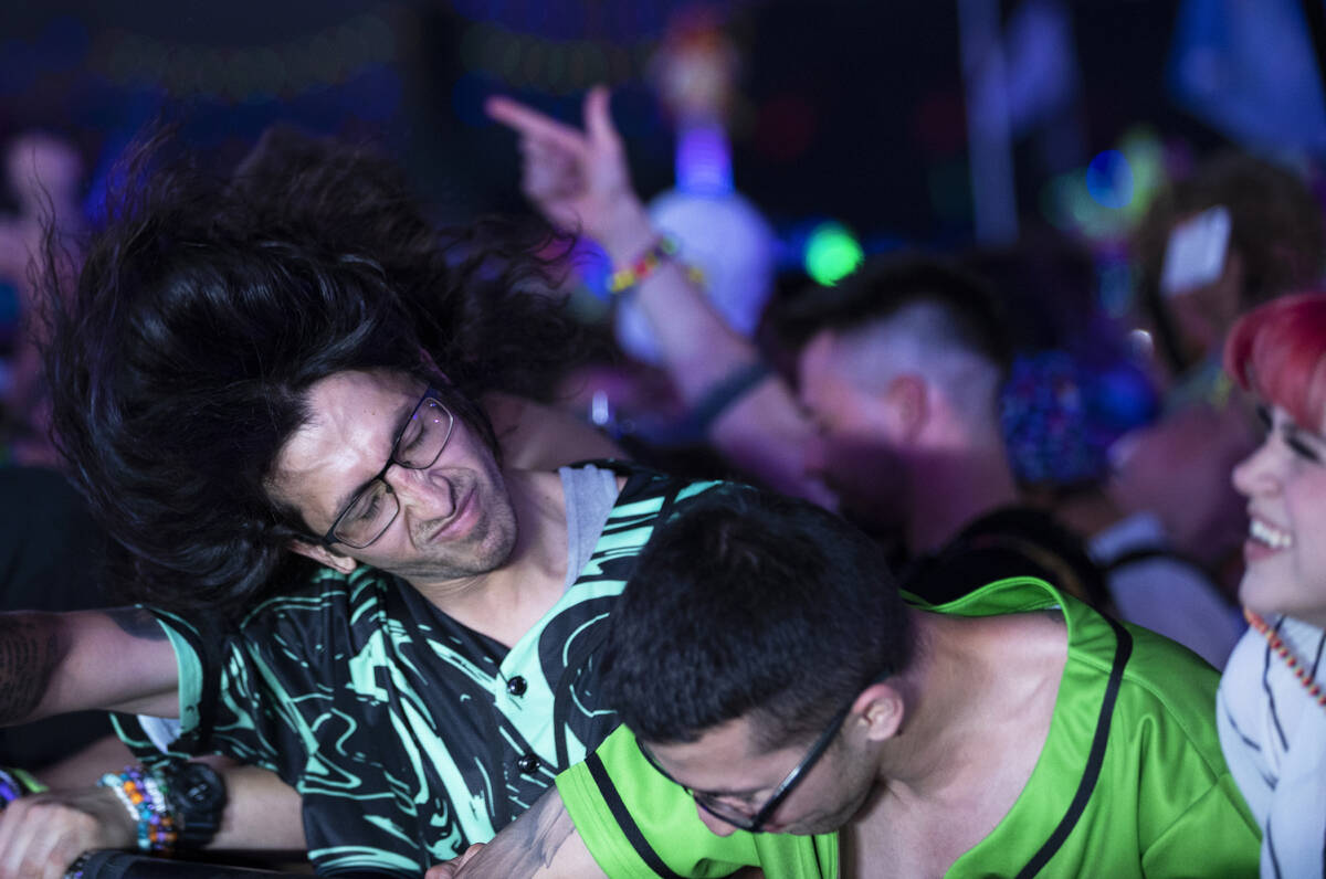Attendees listen to music at Base Pod during day three of Electric Daisy Carnival on Sunday, Ma ...