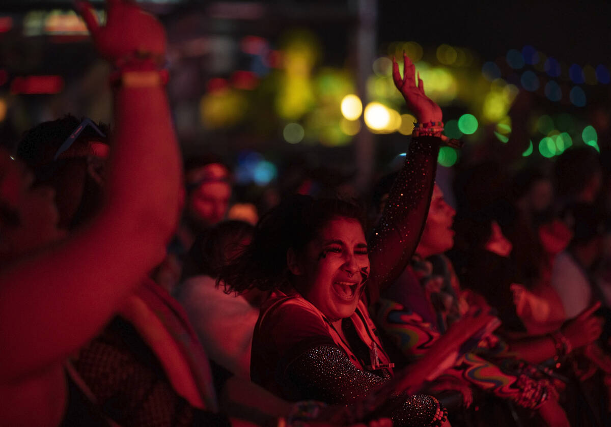 Attendees listen to music at Base Pod during day three of Electric Daisy Carnival on Sunday, Ma ...