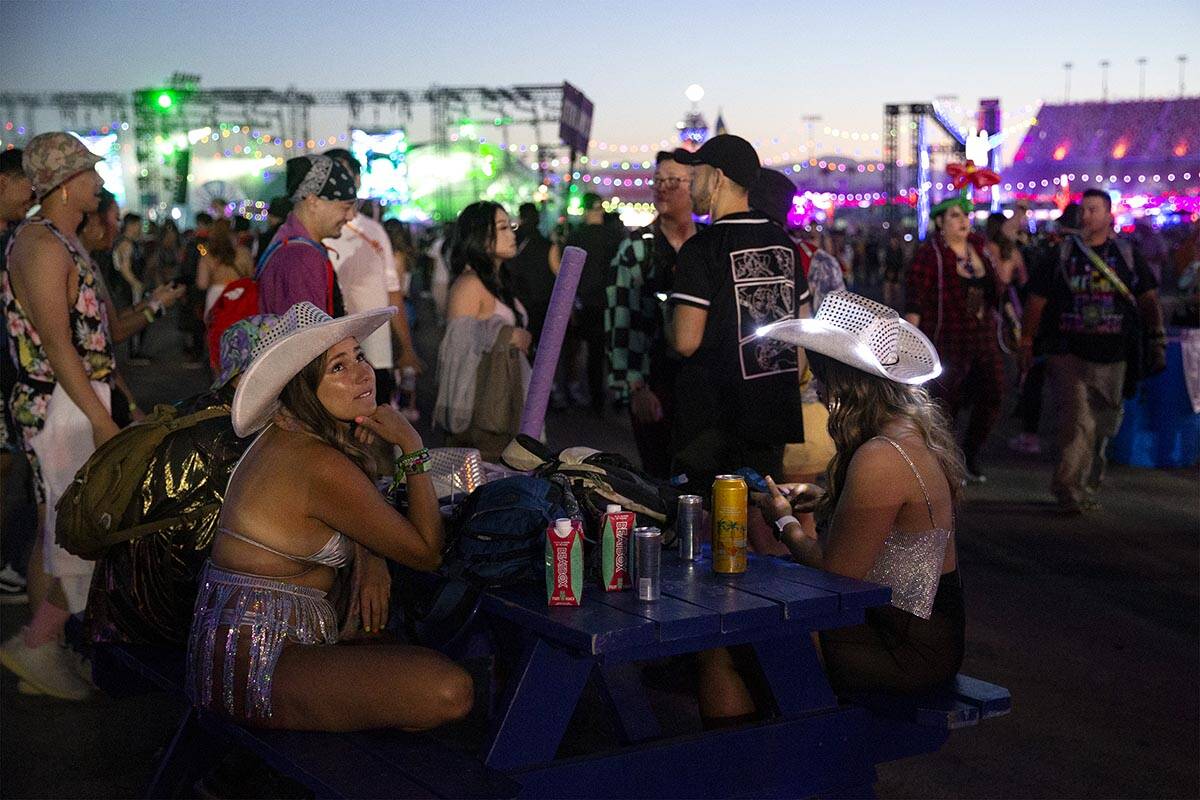 An Electric Daisy Carnival attendee gazes at the Ferris wheel during the second day of the Elec ...