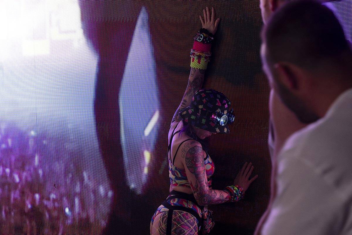 An attendee poses for photos in Memory Lane during the second day of the Electric Daisy Carniva ...