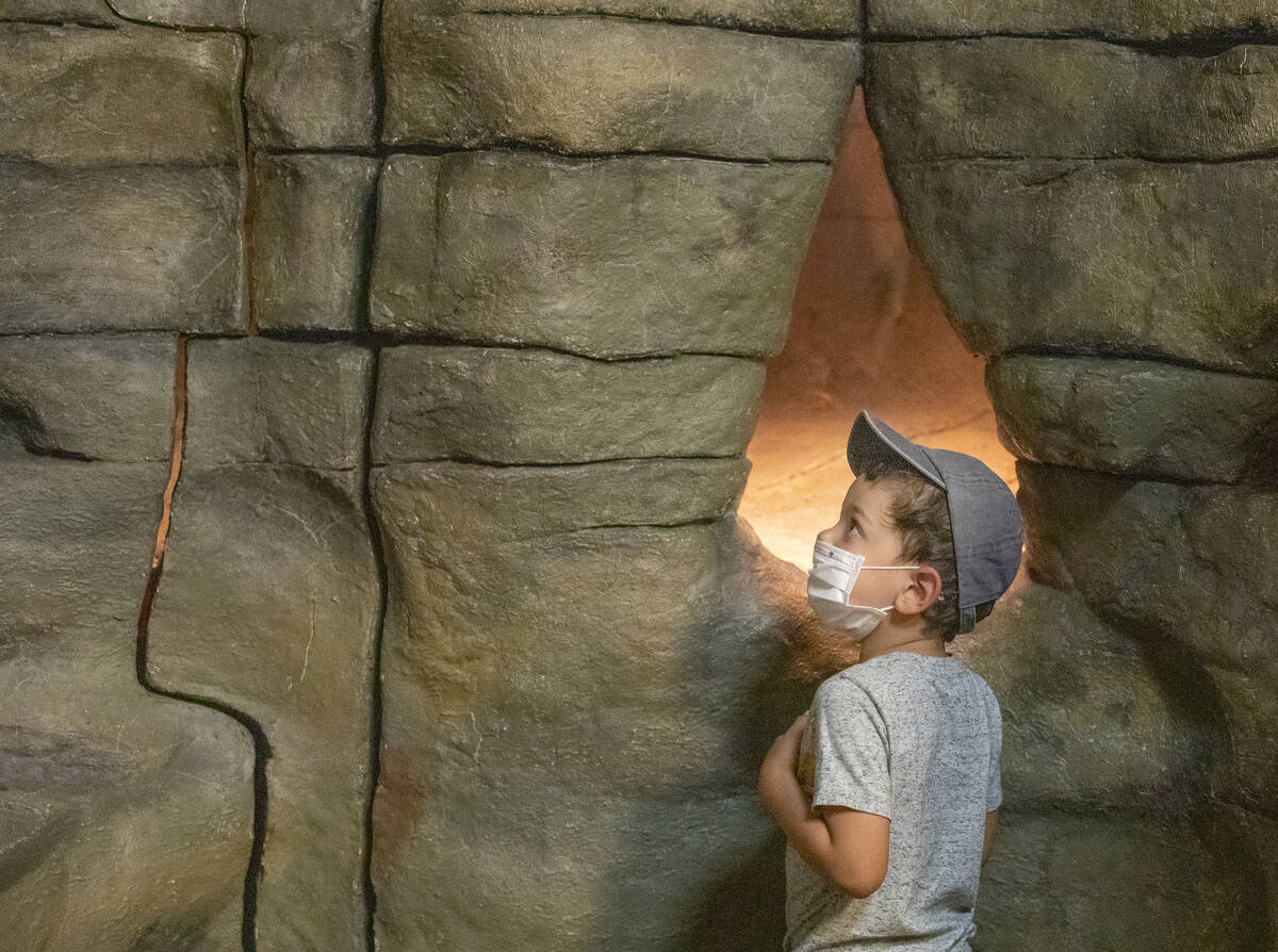 Jackson Trujillo, 4, of Las Vegas, learns about creatures that live in caves at the new exhibit ...