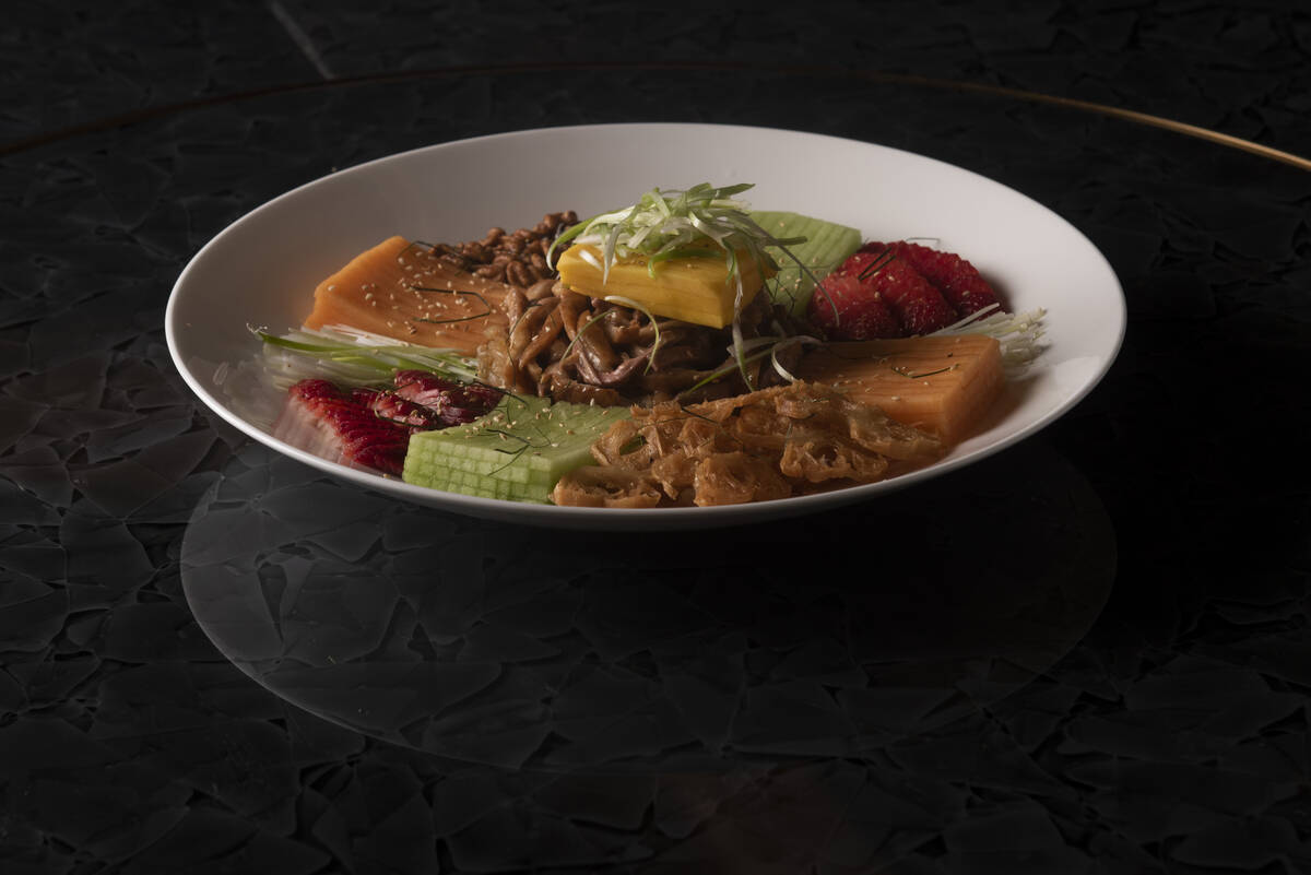 A Salad of Duck and Chef's Selection of Fresh Fruit at Red Plate, a Chinese restaurant in the C ...