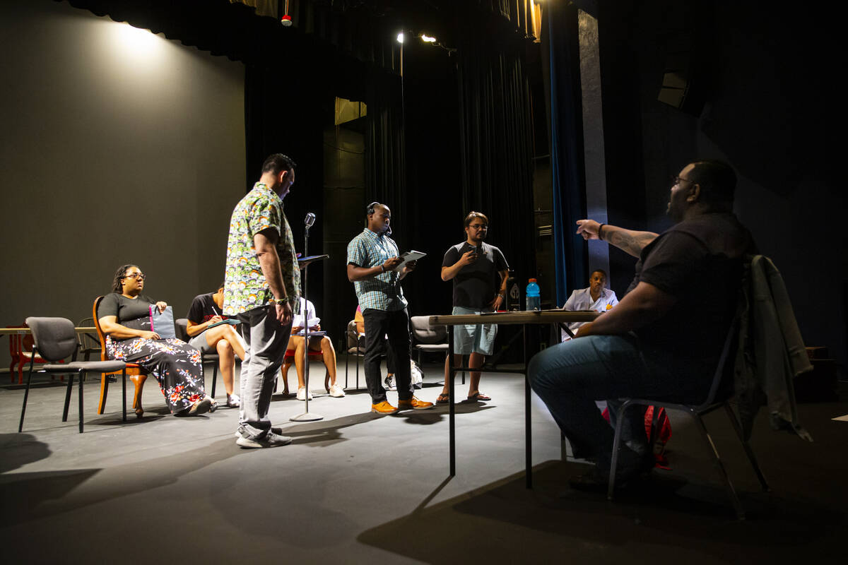 Director and writer Richard Hodges, right, leads a rehearsal of “Black Swan Radio Hour&# ...