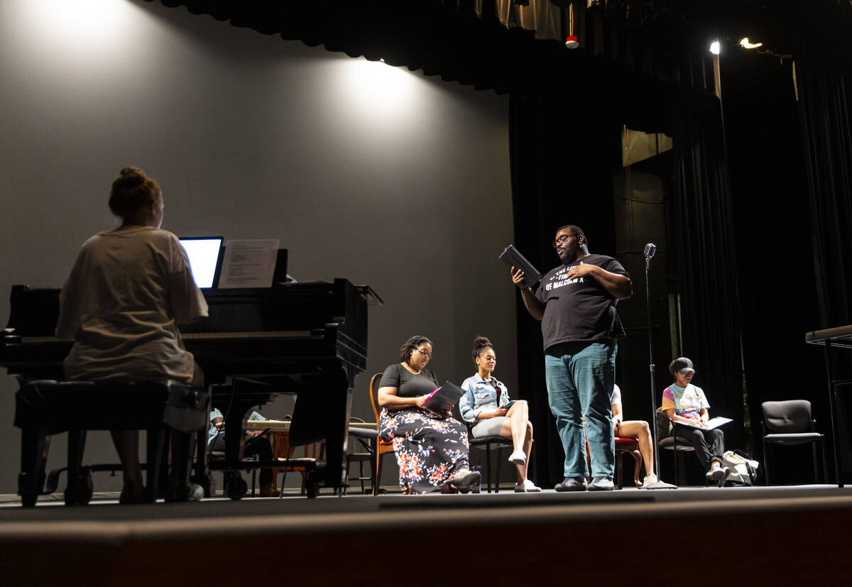 Director and writer Richard Hodges sings during a rehearsal of “Black Swan Radio Hour&#x ...
