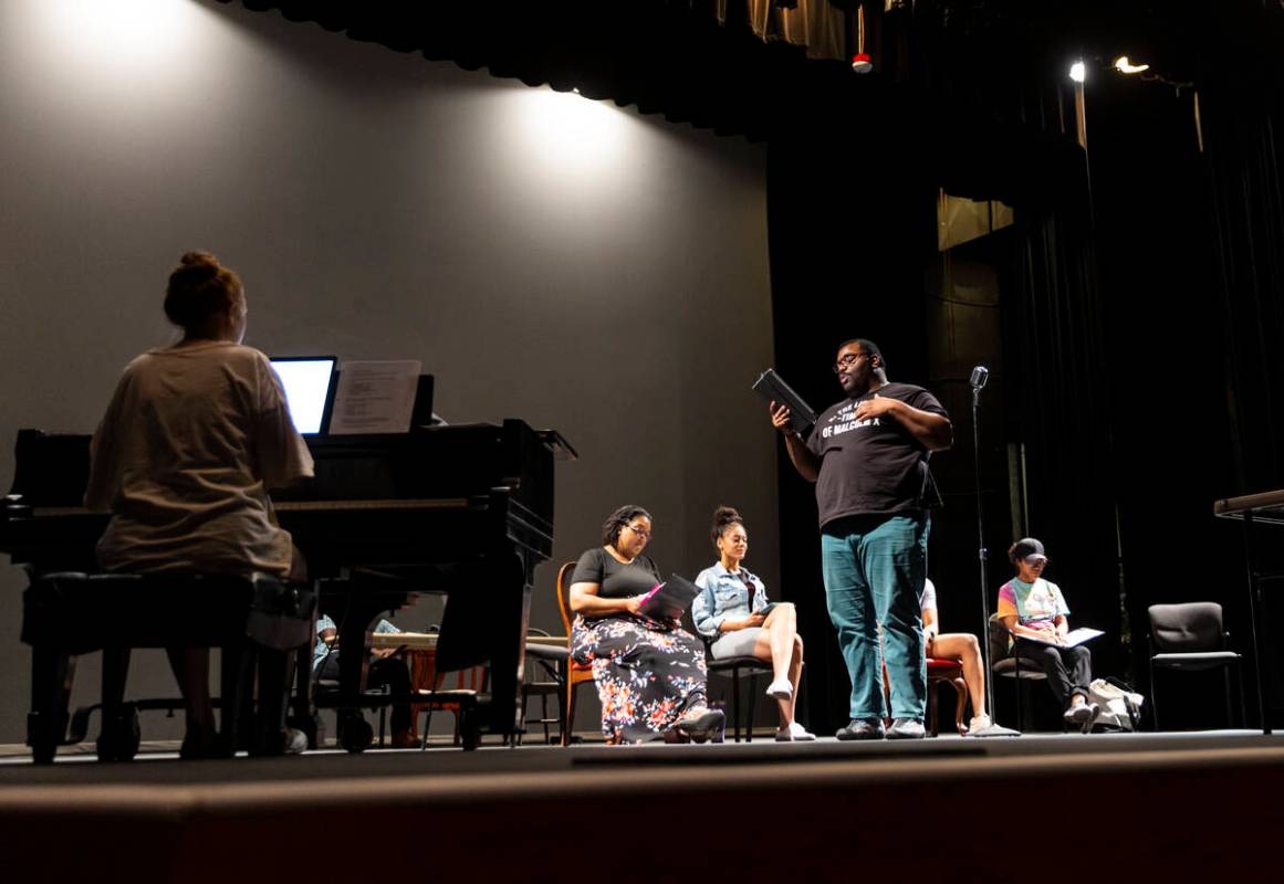 Director and writer Richard Hodges sings during a rehearsal of “Black Swan Radio Hour&#x ...
