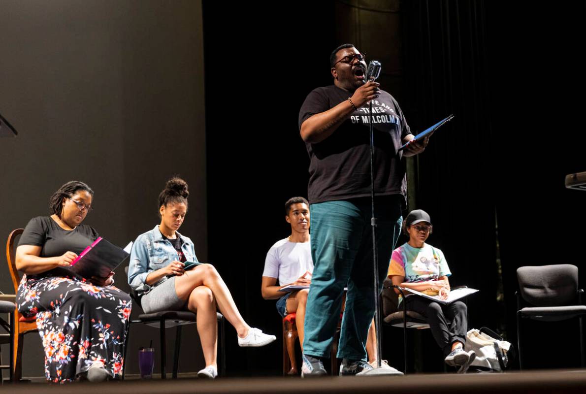 Director and writer Richard Hodges sings during a rehearsal of “Black Swan Radio Hour&#x ...