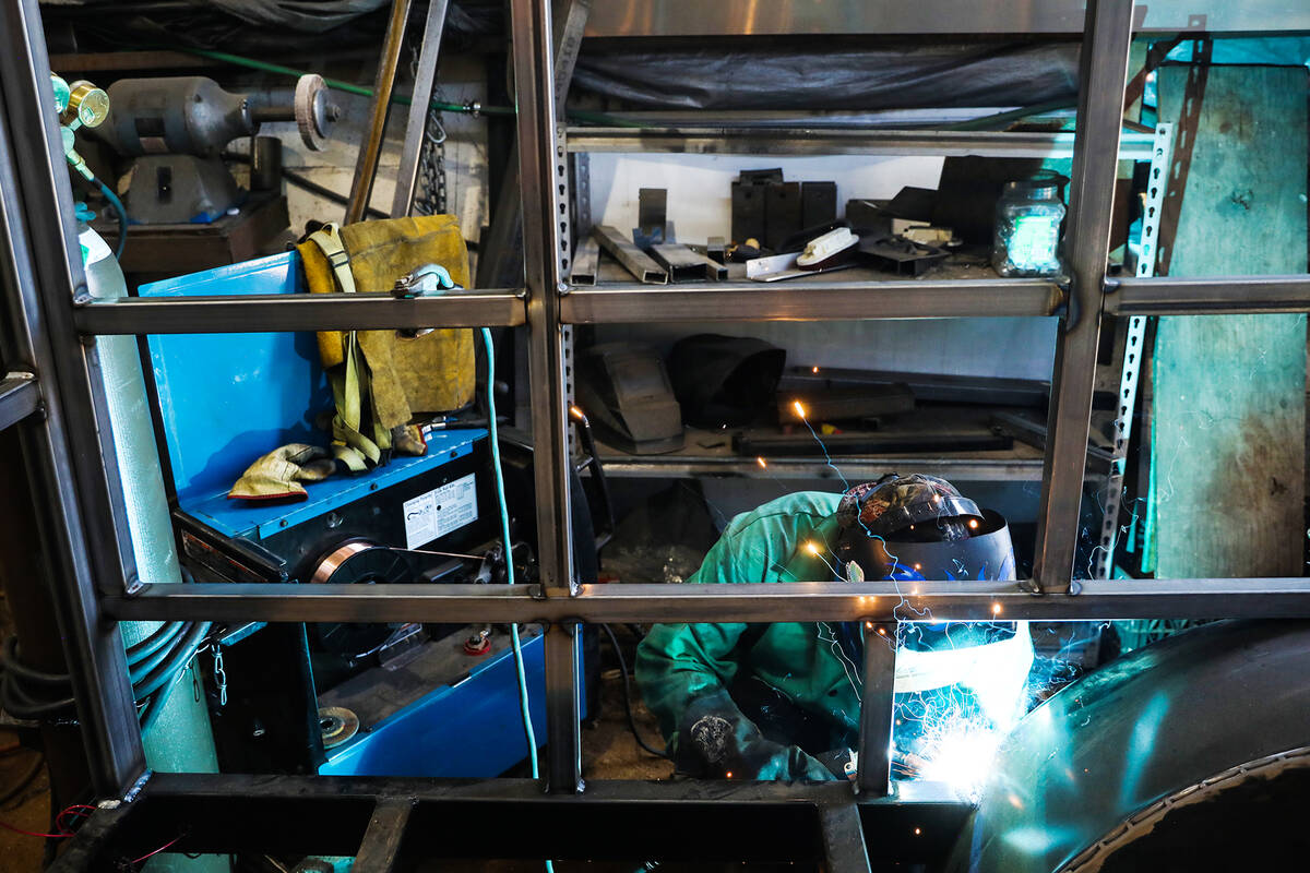 Welder Marcos Reles works on the chassis and framework of a food truck at Ibarra’s, a fo ...