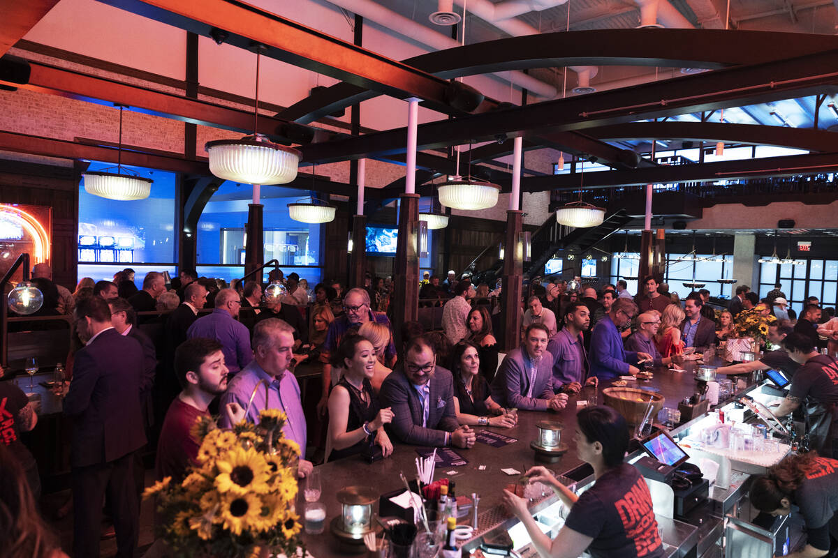 People socialize at Mabel's BBQ during the pre-opening party at the Palms on Wednesday, April 2 ...