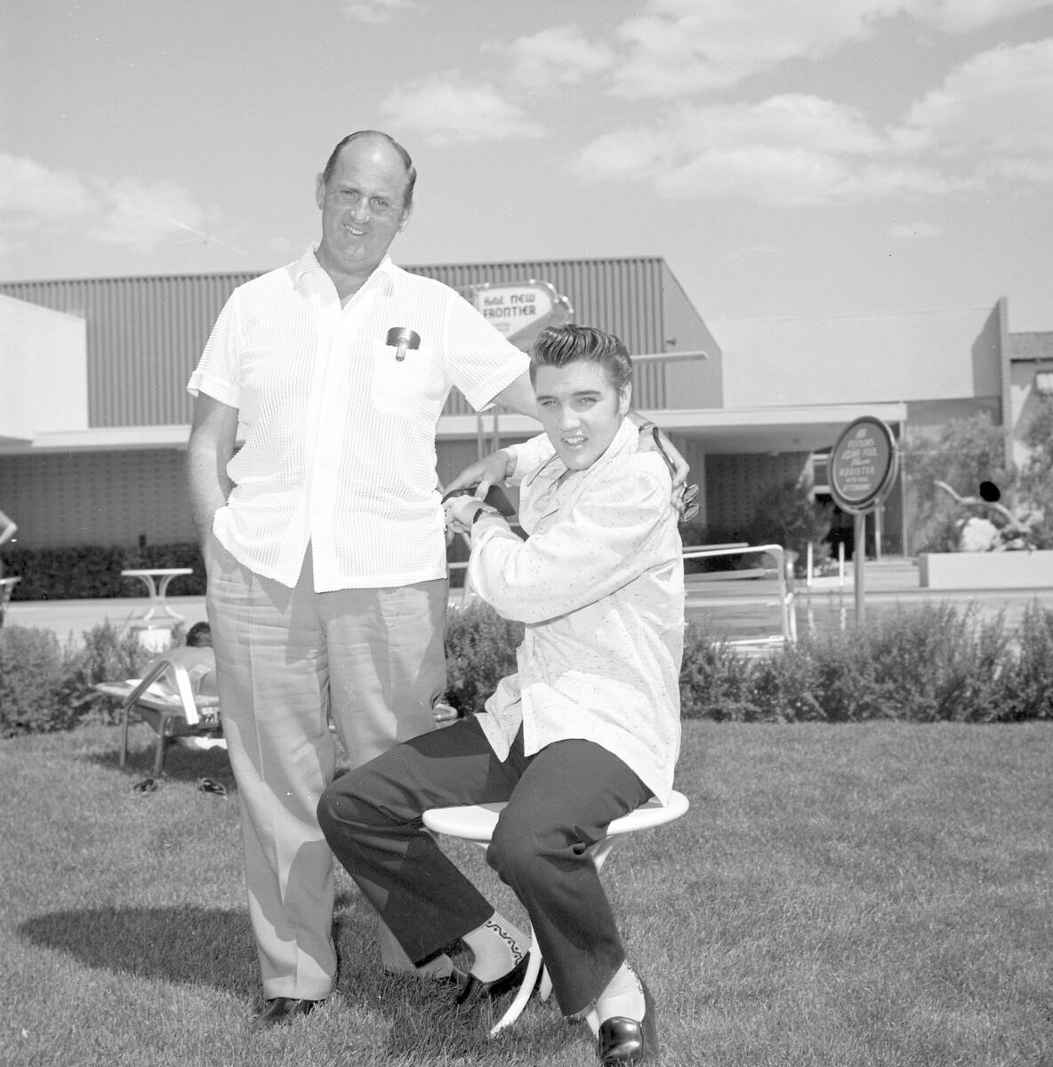 Colonel Tom Parker and Elvis Presley are photographed in April 1956 during the singer's first L ...