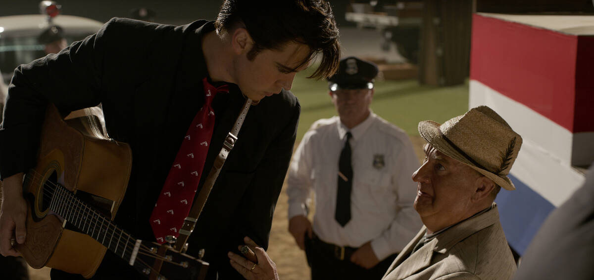 Austin Butler, left, as Elvis Presley and Tom Hanks as Colonel Tom Parker in "Elvis." (Hugh Ste ...