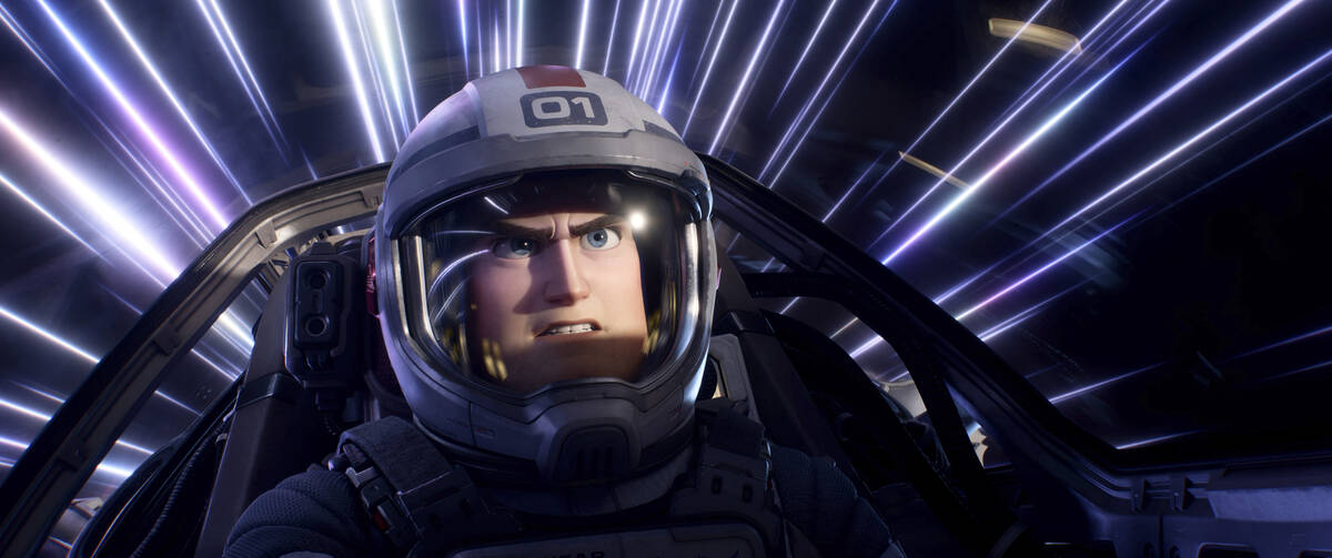 This image released by Disney/Pixar shows character Buzz Lightyear, voiced by Chris Evans, in a ...