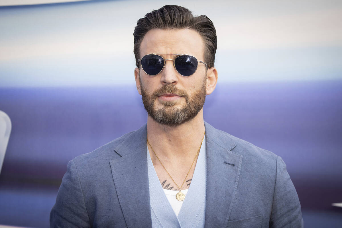Chris Evans poses for photographers upon arrival for the premiere of the film 'Lightyear' in Lo ...